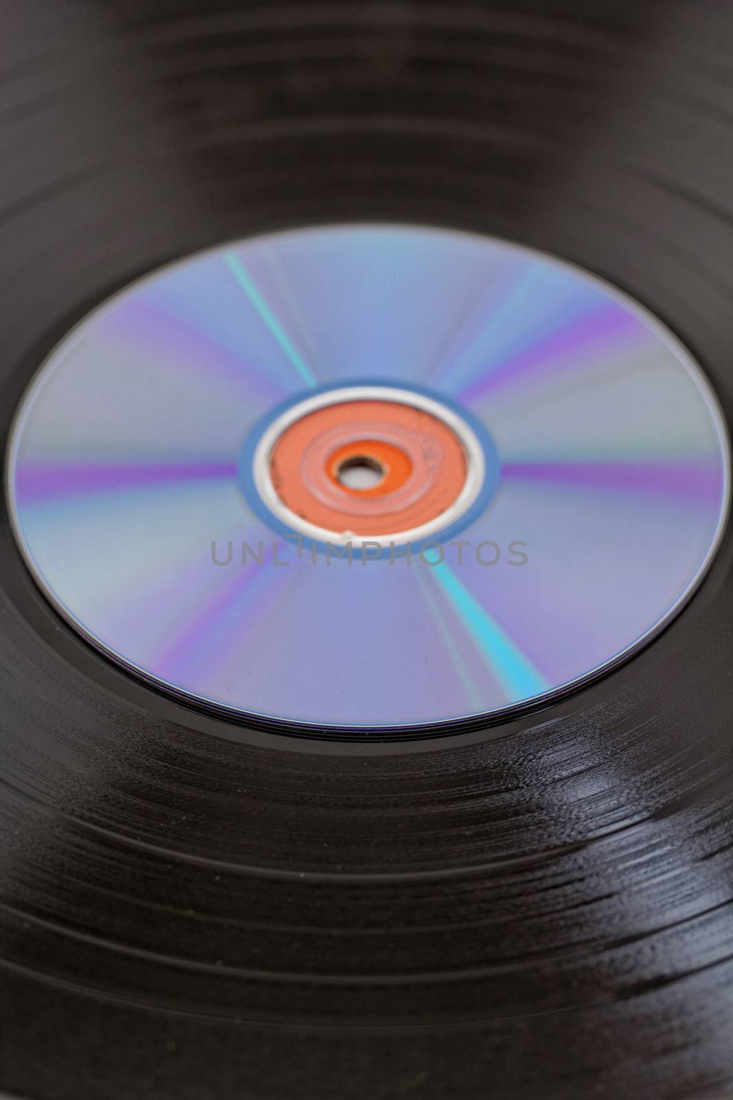 vinyl record  disk and CD (Compact disk) on white background