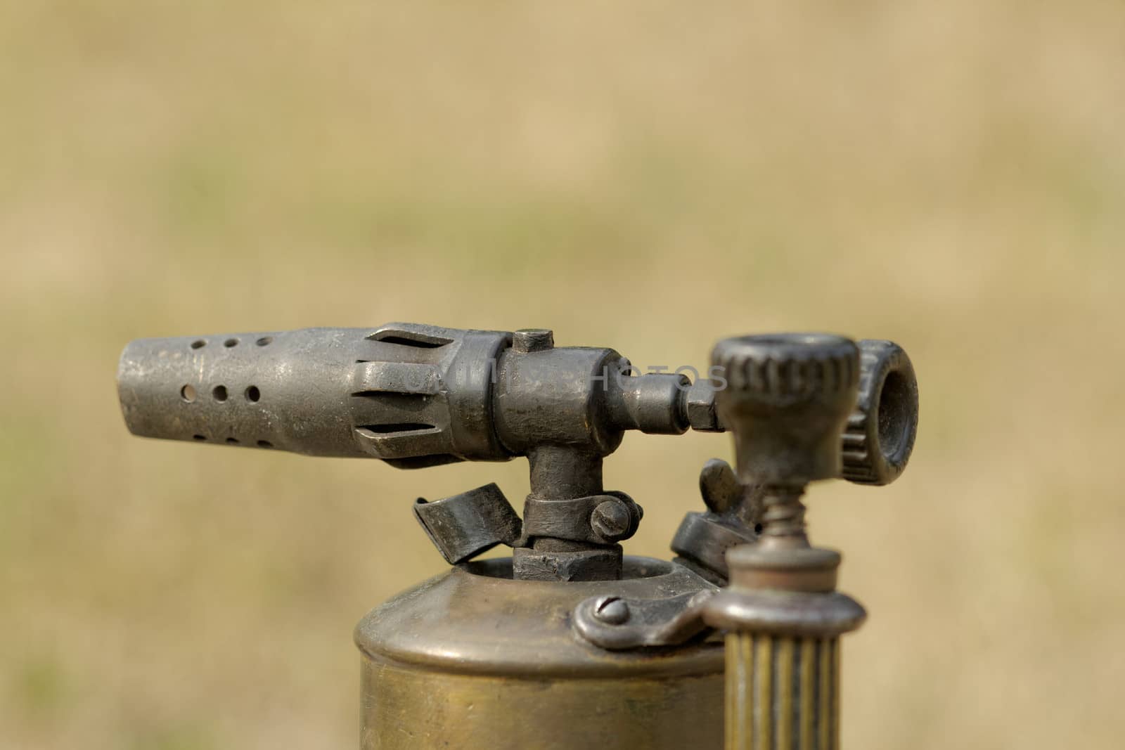 close-up of a antique gasoline welder from second worl war