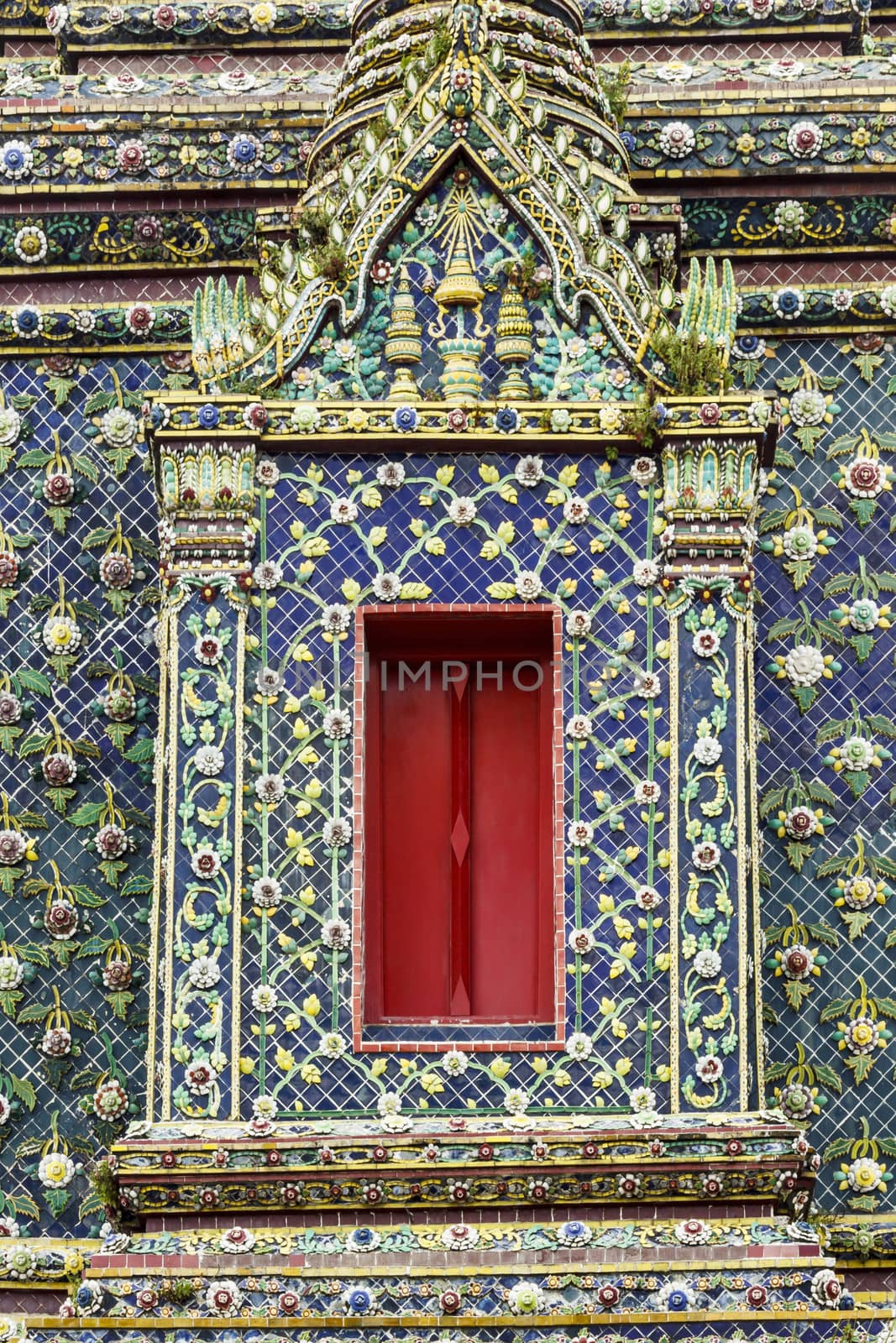 Beautiful mosaic window in Thai public temple.