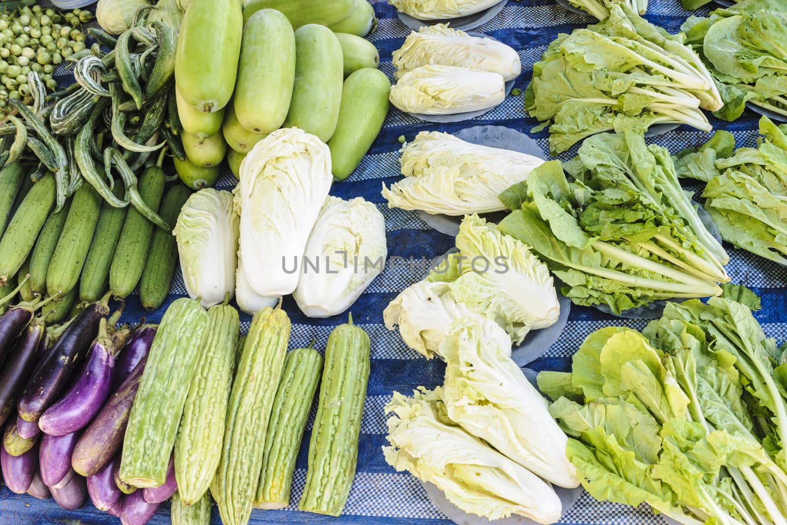 Fresh organic vegetables on local market. by ngungfoto