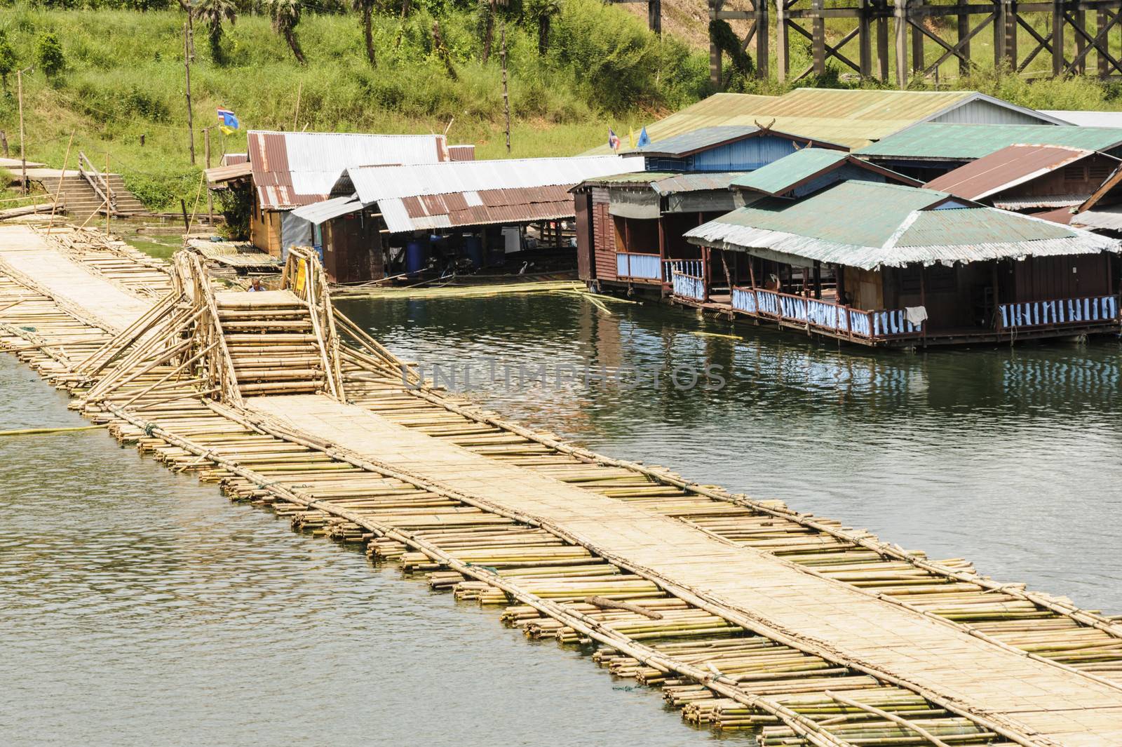 Antique bamboo bridge in Songkhla Buri, Thailand.  by ngungfoto