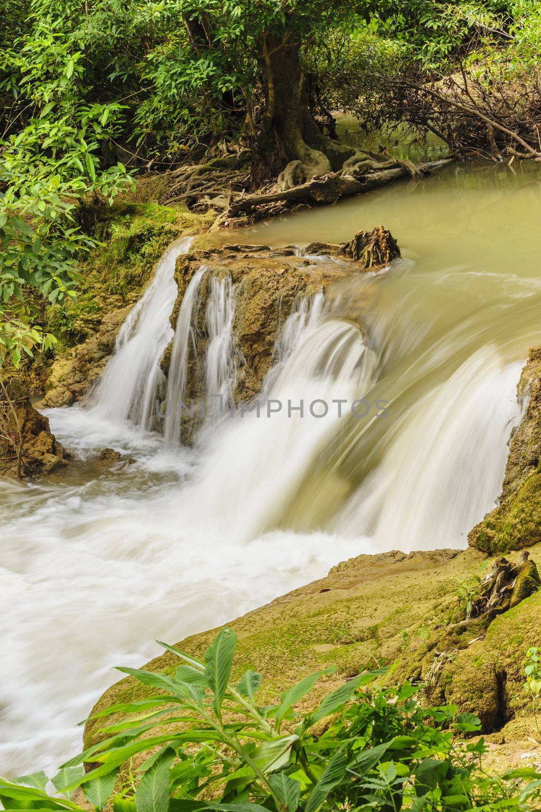 Beautiful waterfall in Khao Laem National Park, Thailand. by ngungfoto