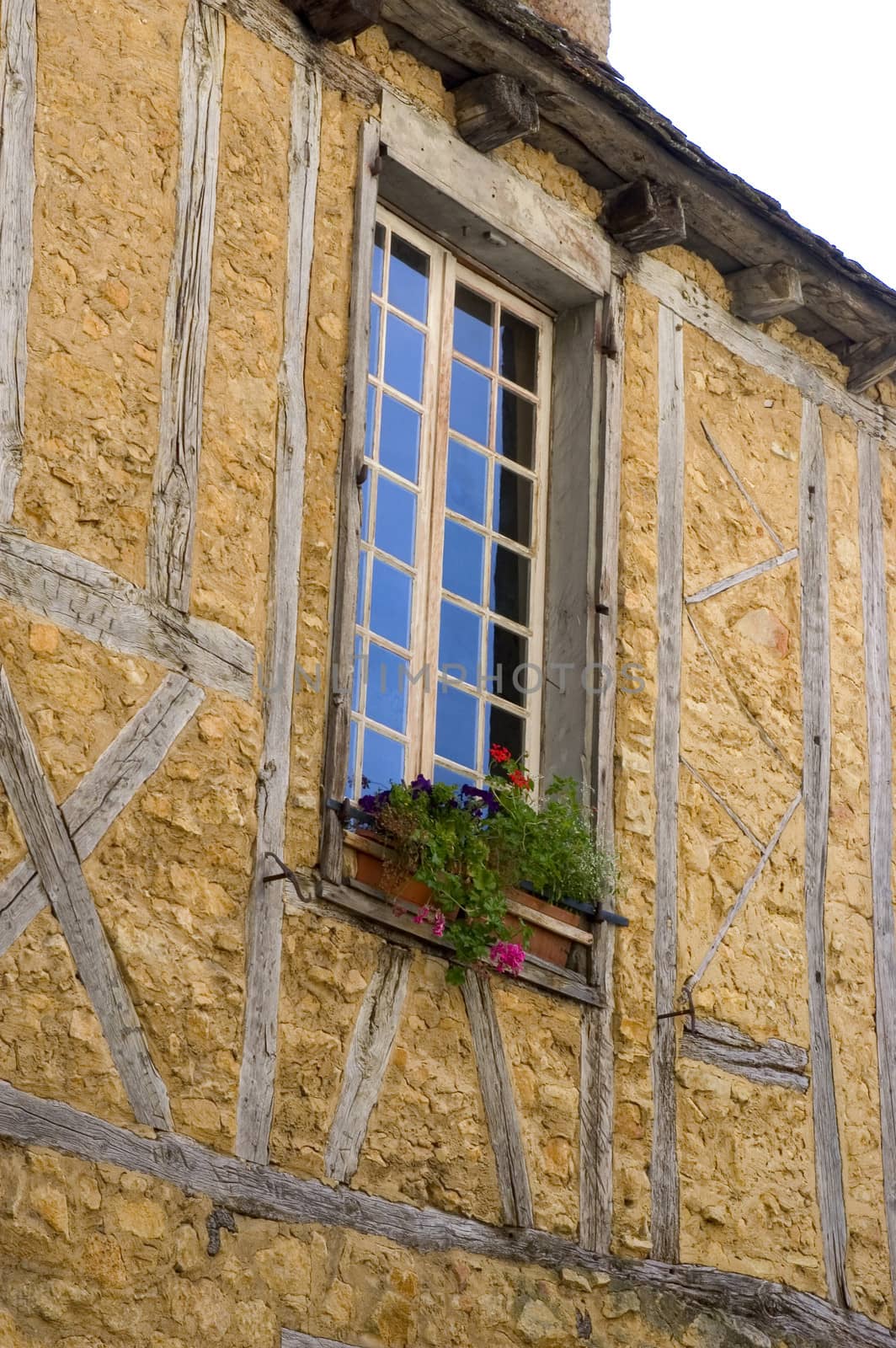 A window of an old building in the center of Sarlat by gillespaire