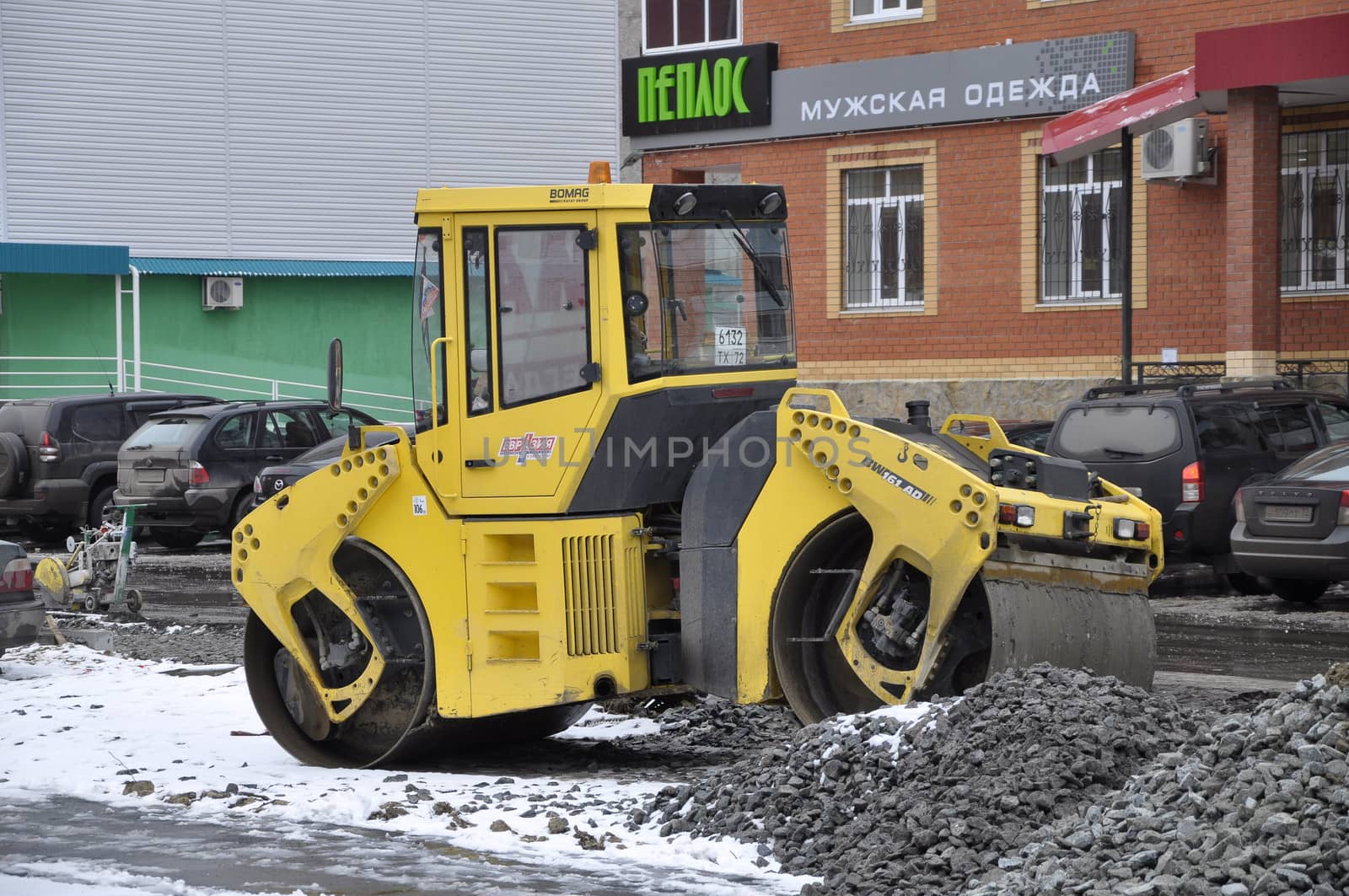 Special equipment on road repair. Skating rink.