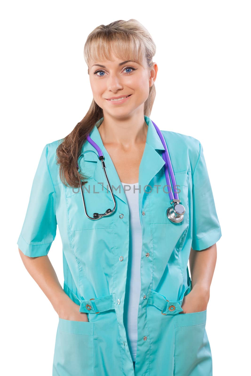 friendly female doctor with hands in pockets isolated by mihalec