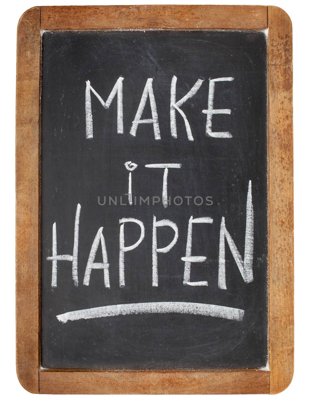 make it happen - motivational reminder  - white chalk handwriting on a vintage slate blackboard
