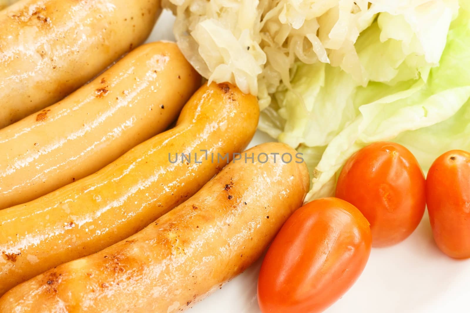 Premium pork sausages on a plate