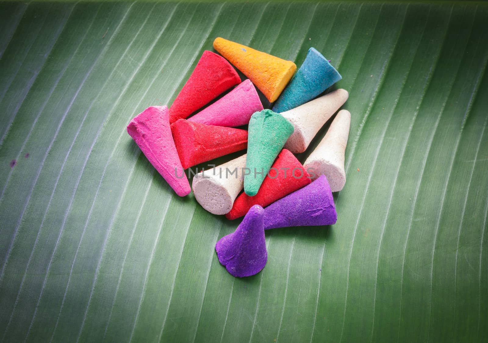 colorful Incense on banana leaf