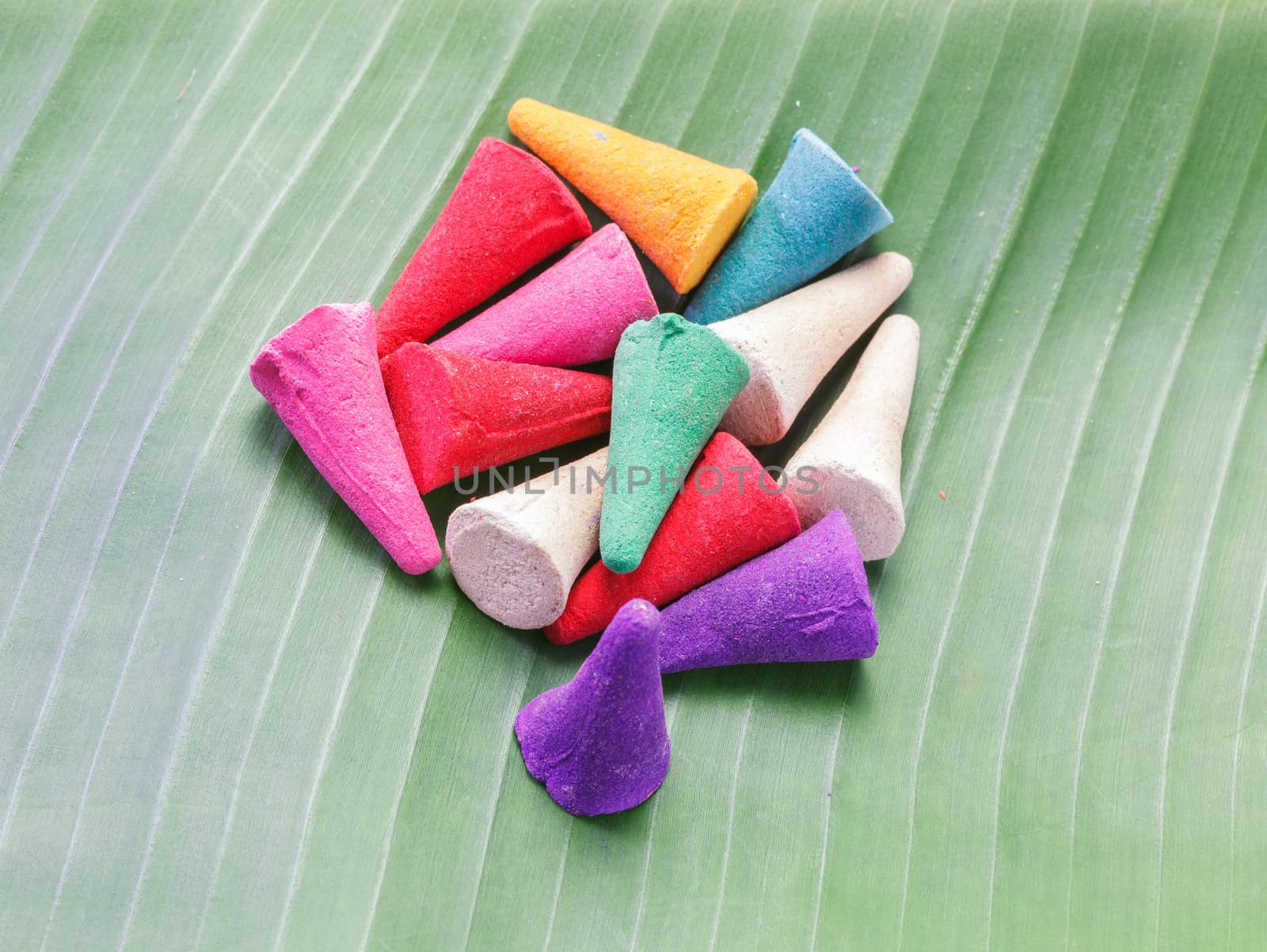 colorful Incense on banana leaf
