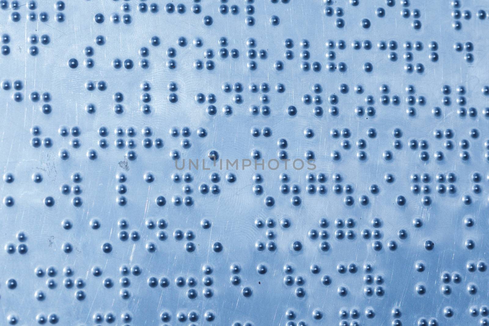 background of metal sheet with braille dots