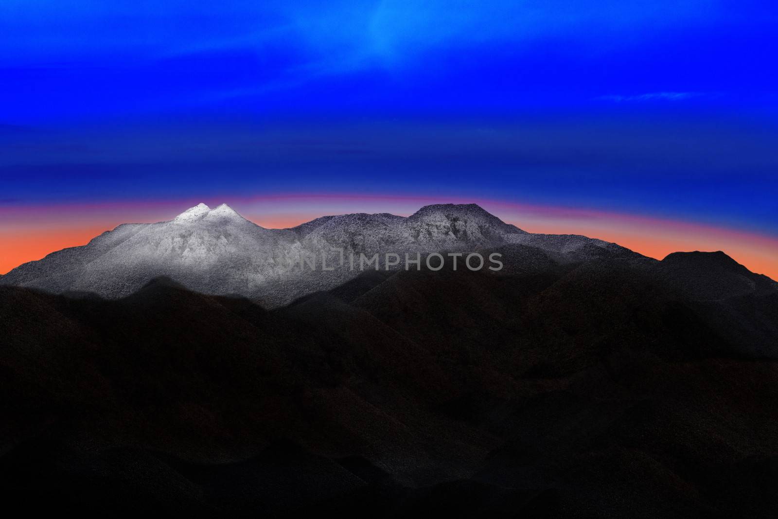 land scape of snow mountain hill with beautiful dramatic colorful sky before morning dawn light use for nature background and backdrop