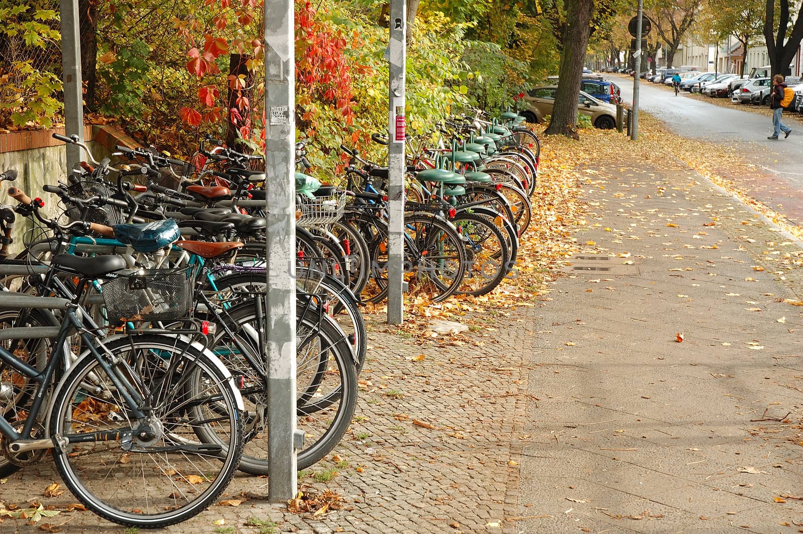 POTSDAM, GERMANY - OCTOBER 20: Bicycles waiting nearby railway station somewhere in Potsdam Germany 20.10.2013