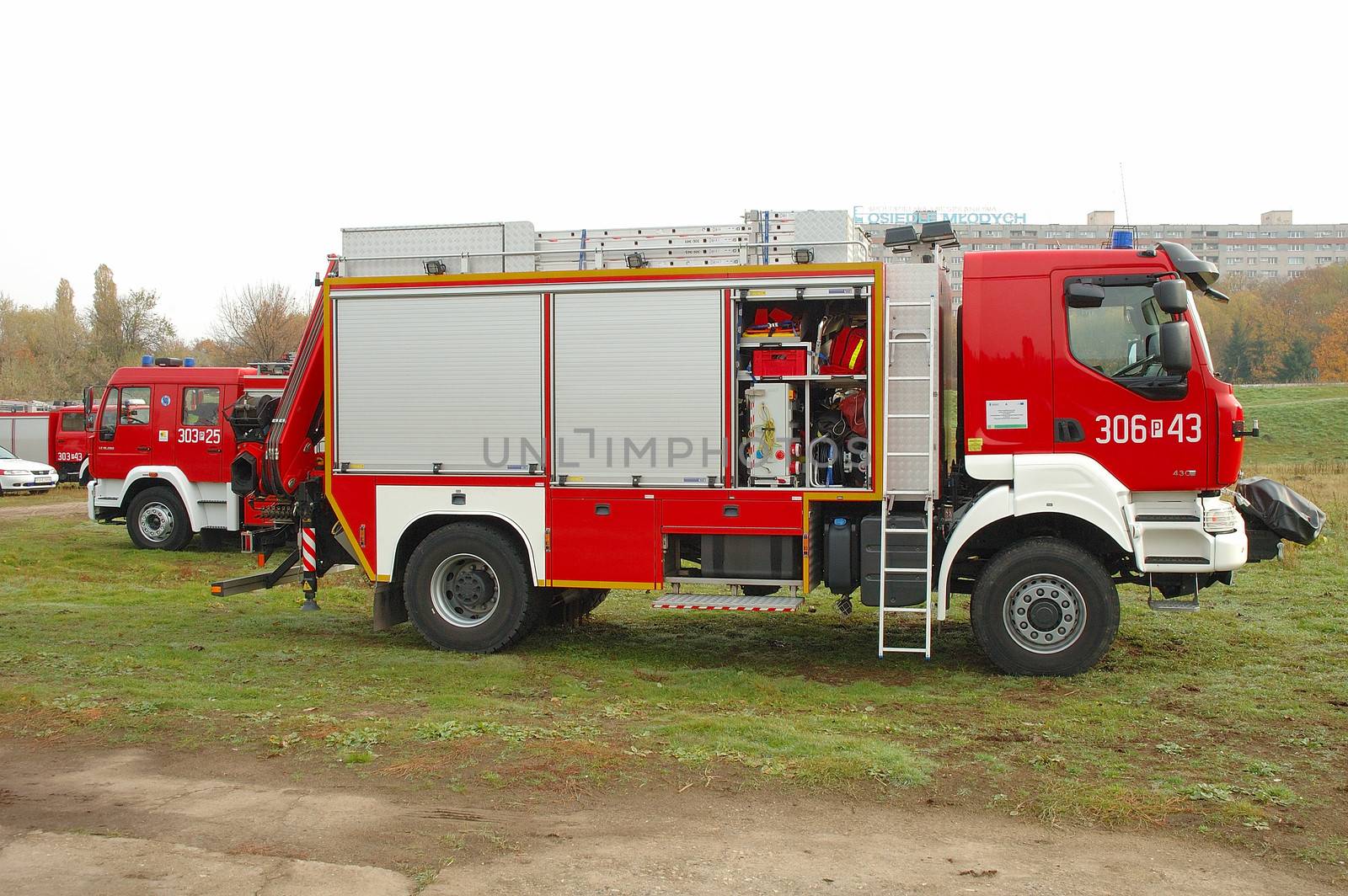 POZNAN, POLAND - OCTOBER 25: Fire brigade trucks during exercises on Warta river bank in Poznan Poland 25.10.2013