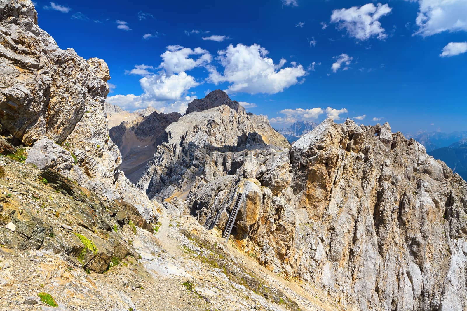 footpath on Costabella ridge with a big wooden ladder, Trentino, Italy