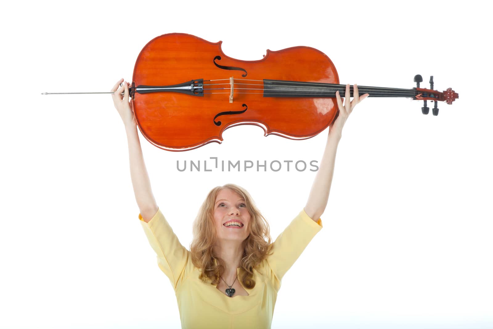 young woman holding cello up in the air and white background