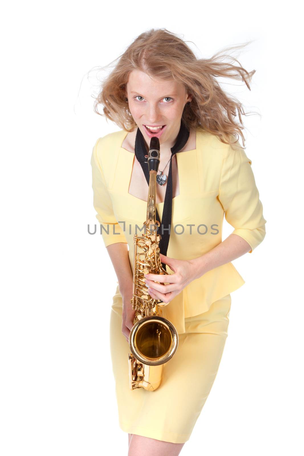 sexy girl with saxophone against white background