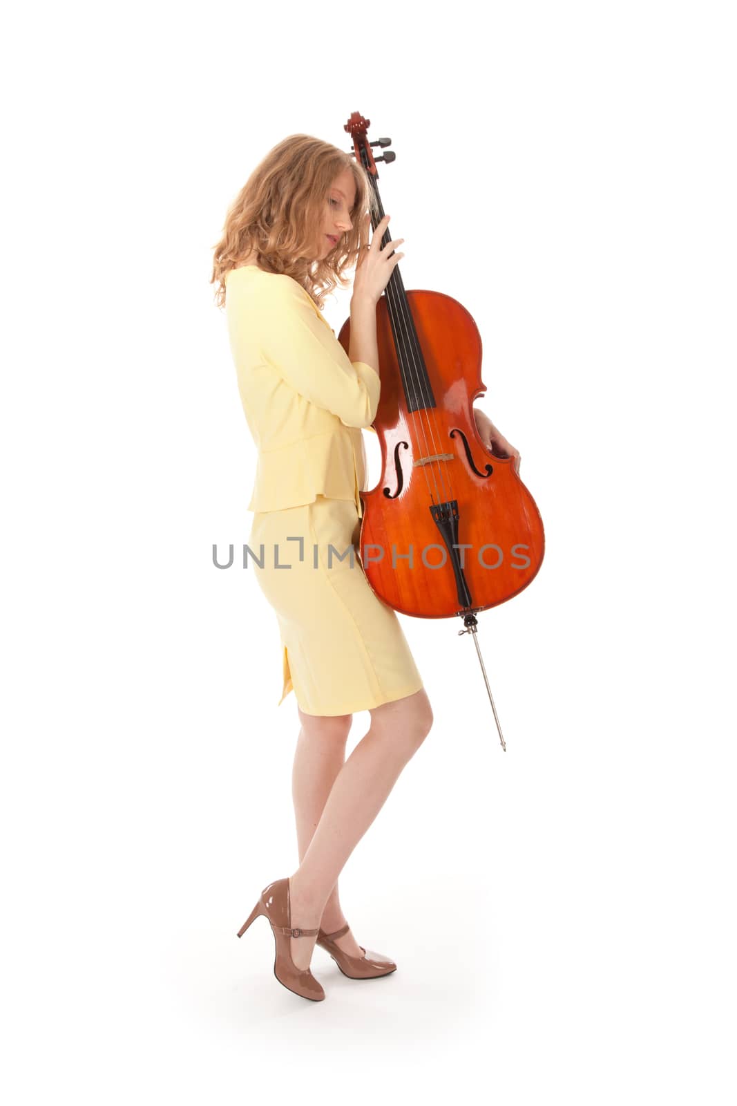 young pretty woman holding cello against white background