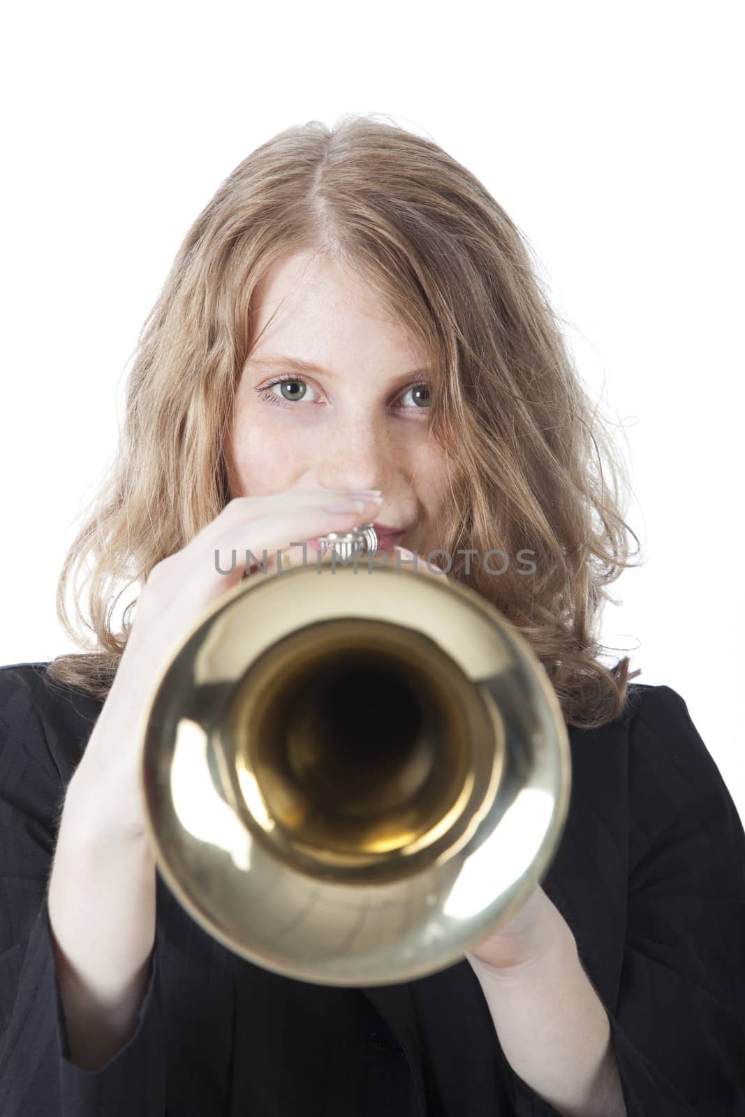closeup of young woman playing the trumpet against white background