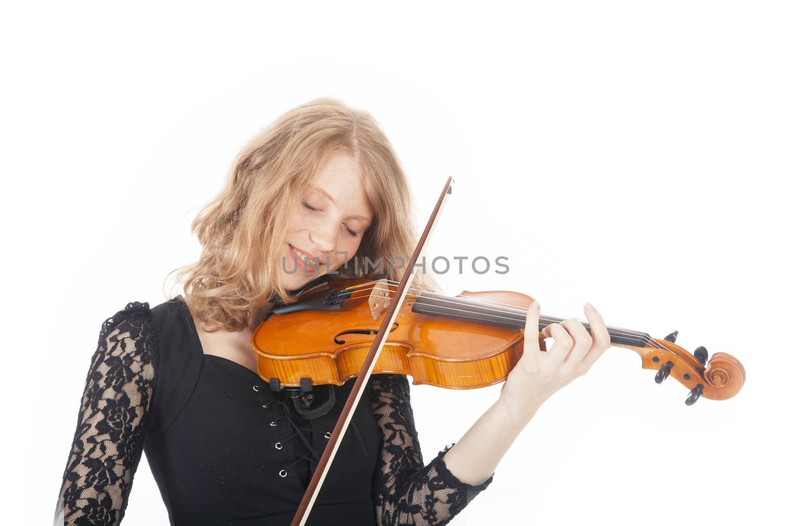young woman in black dress playing violin against white background