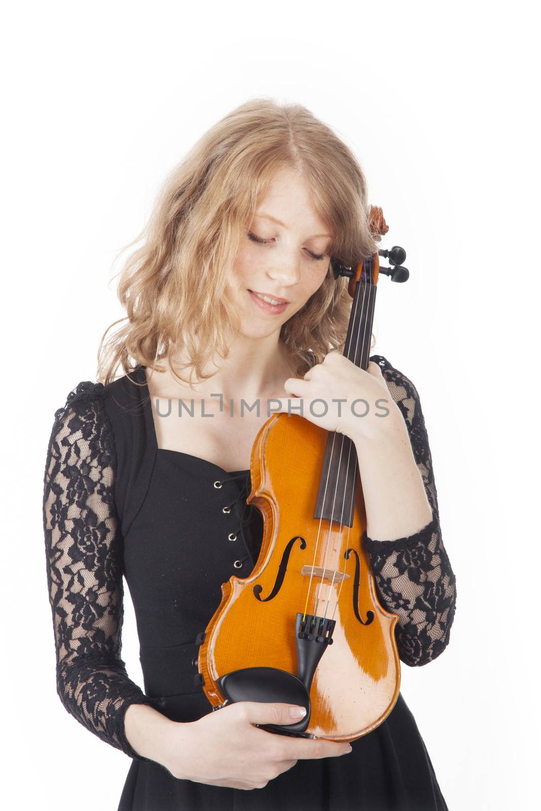young pretty woman holding violin against white background