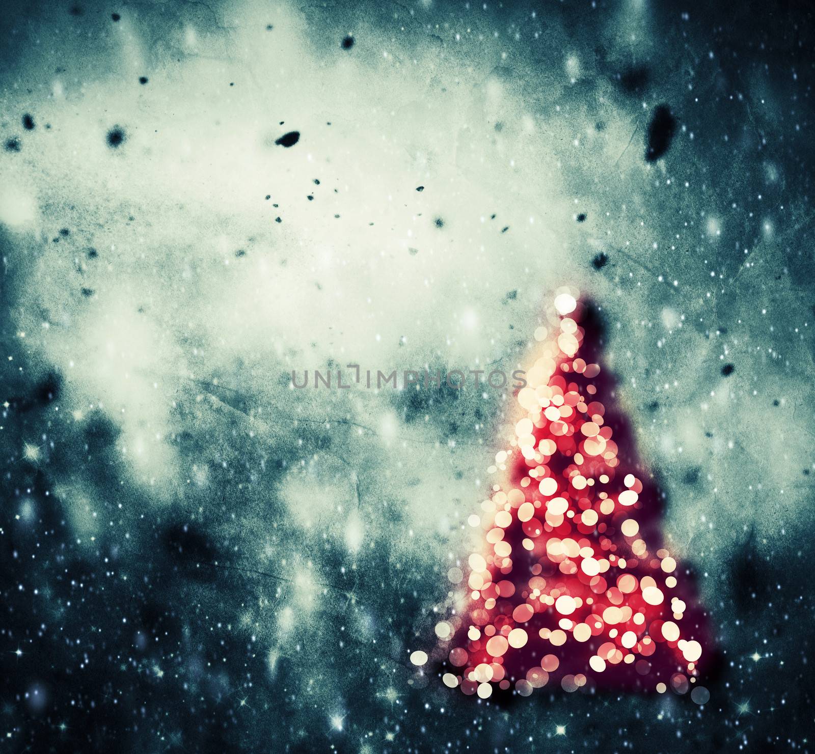 Christmas tree glowing on winter background with snow storm, frost, glittering lights. Vintage texture.