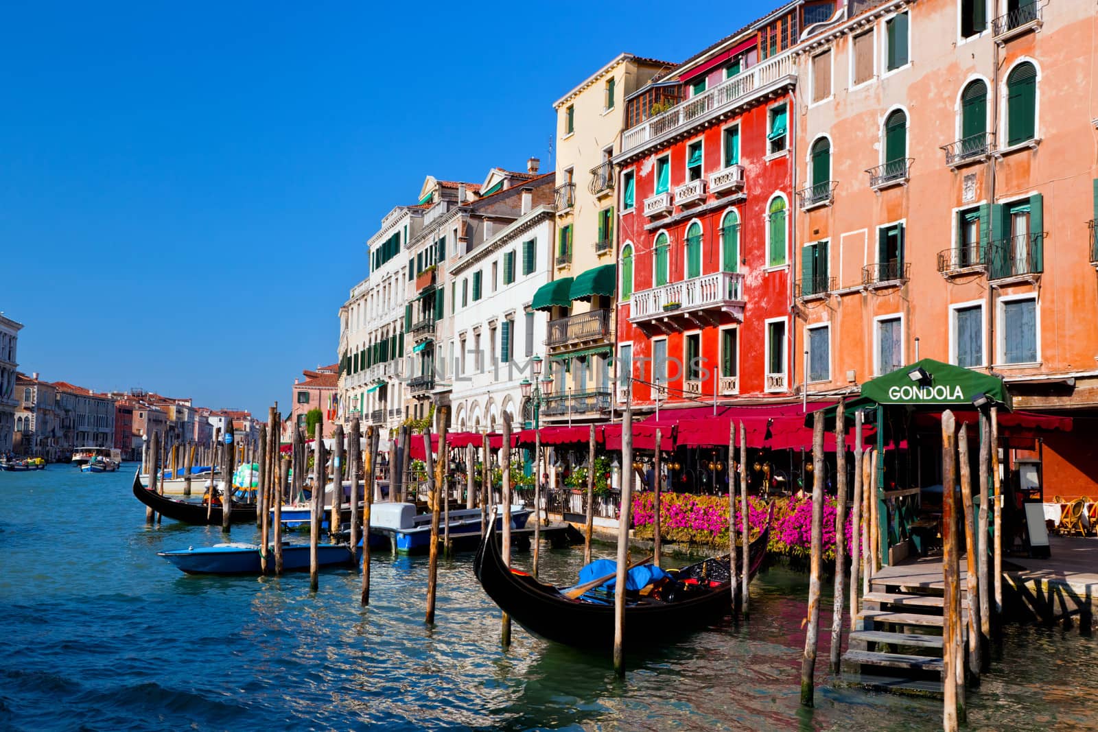 Venice Grand Canal, Italian Canal Grande and gondola small harbor. Old Venetian architecture, boats