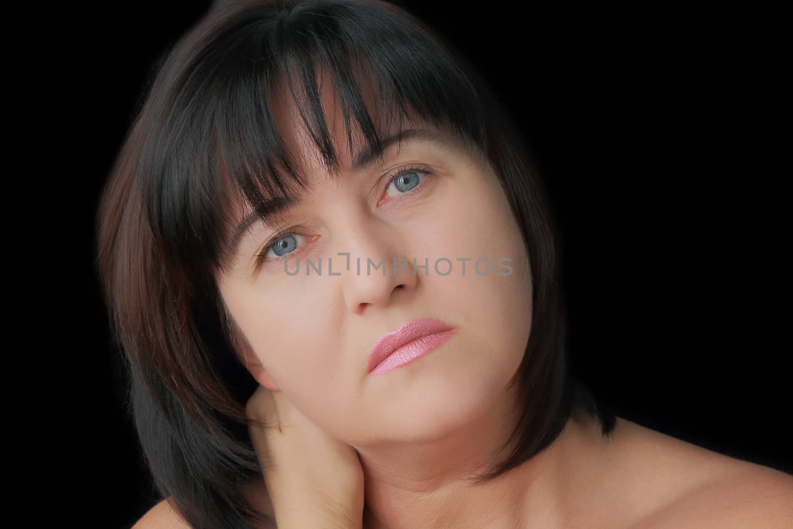 Portrait of woman with blue eyes and black hair