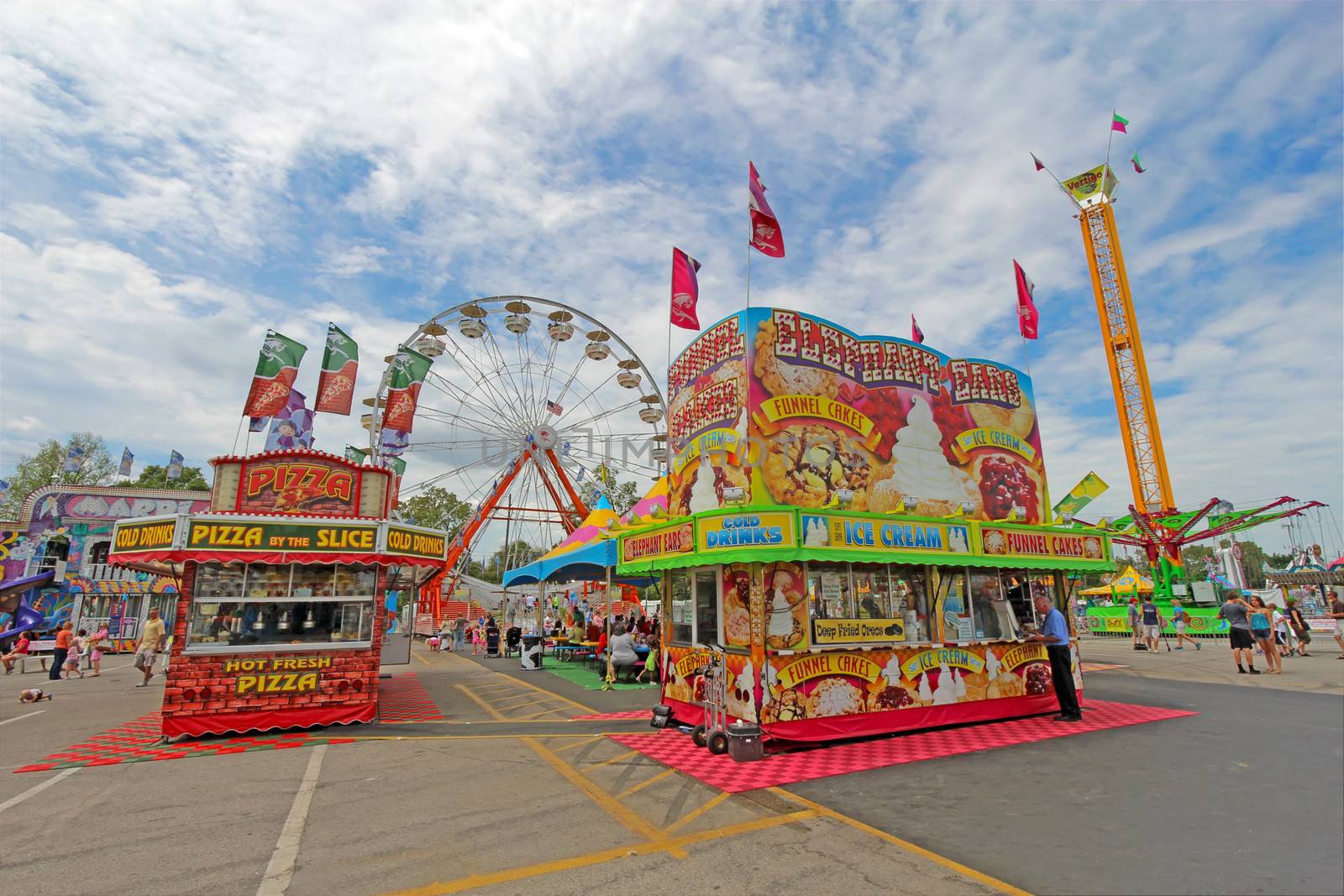 INDIANAPOLIS, INDIANA - AUGUST 12: Vendors and rides on the Midway at the Indiana State Fair on August 12, 2012. This very popular fair hosts more than 850,000 people every August.