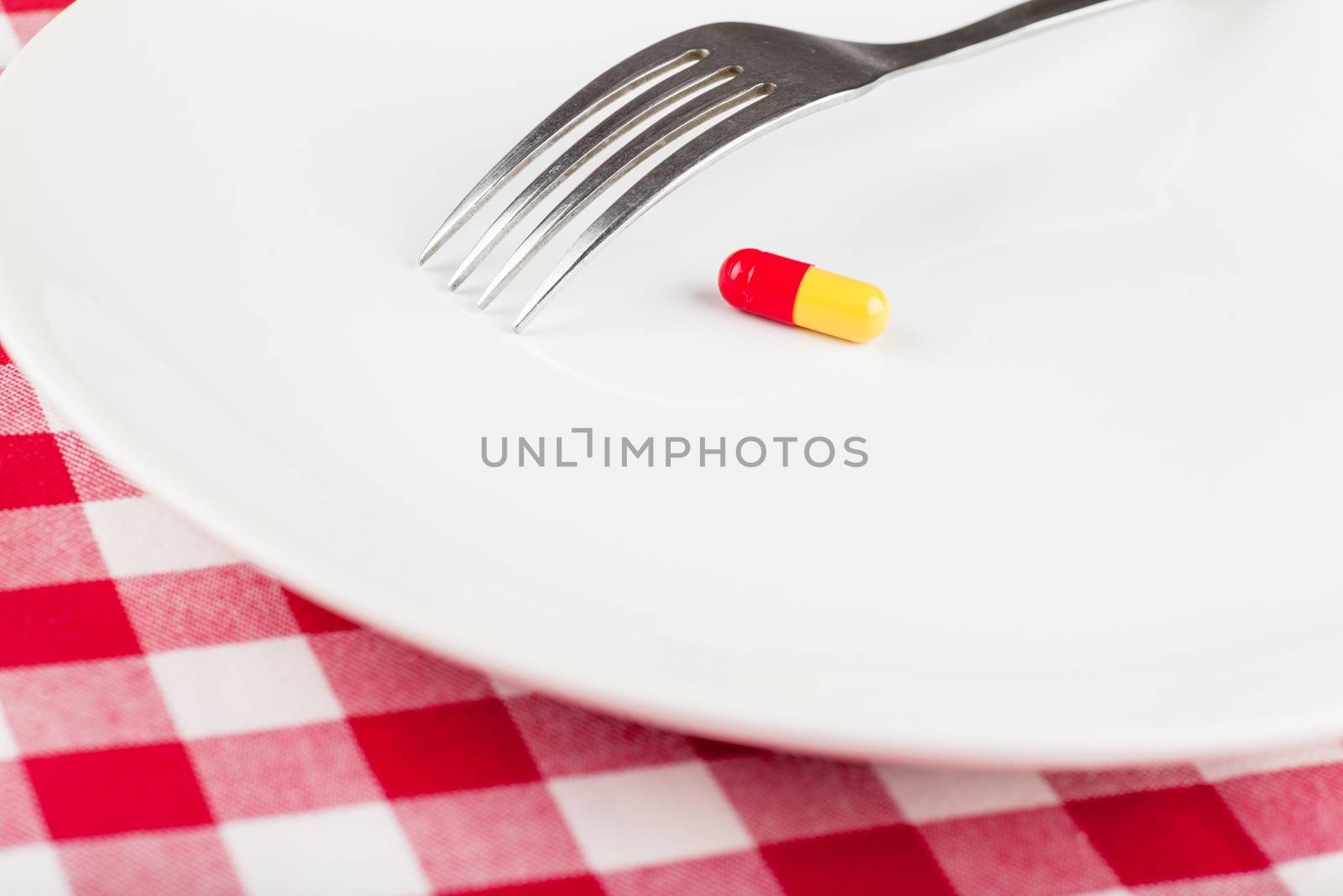 Pill on a plate by AGorohov