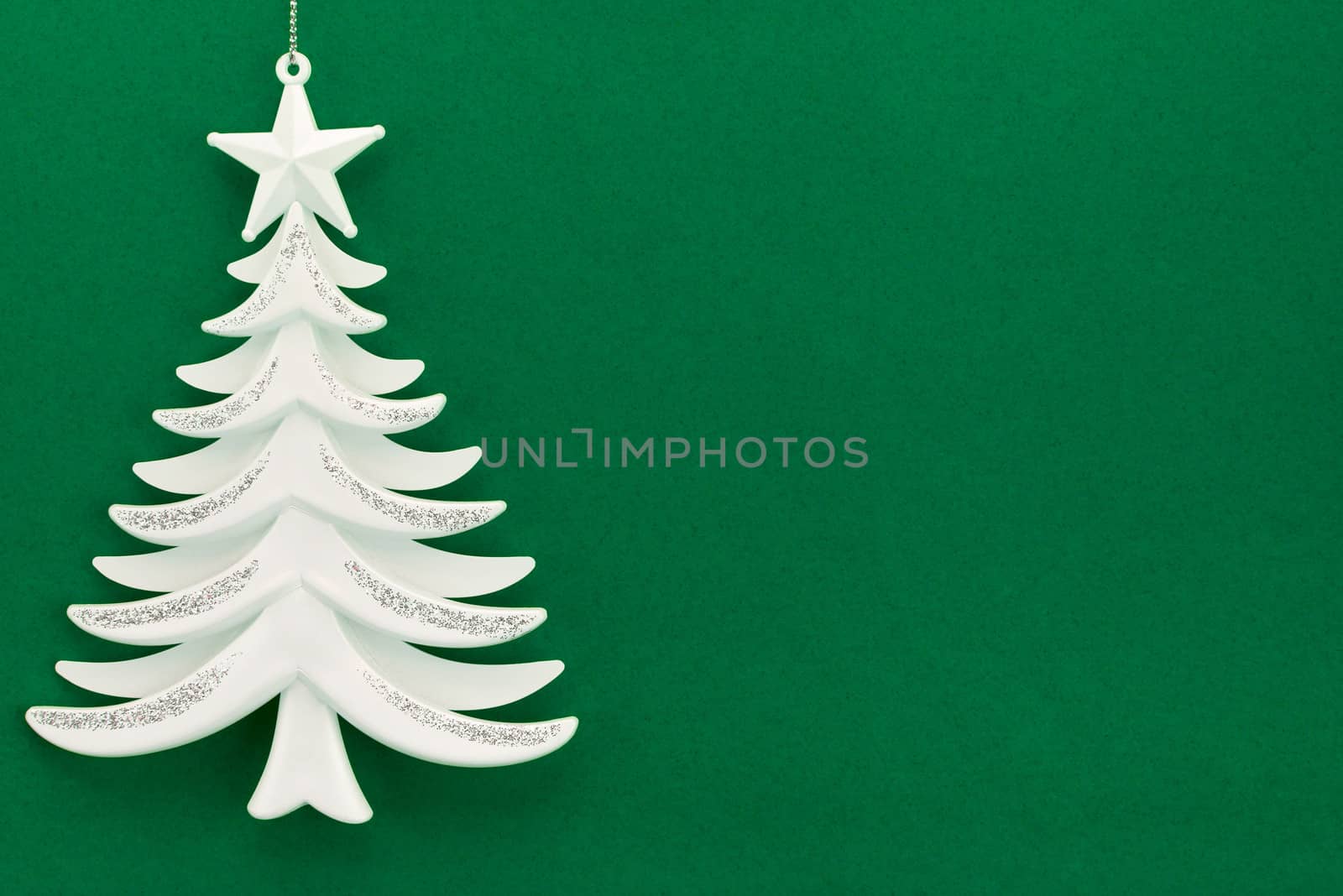 Christmas tree on a background of green velvet paper by zeffss