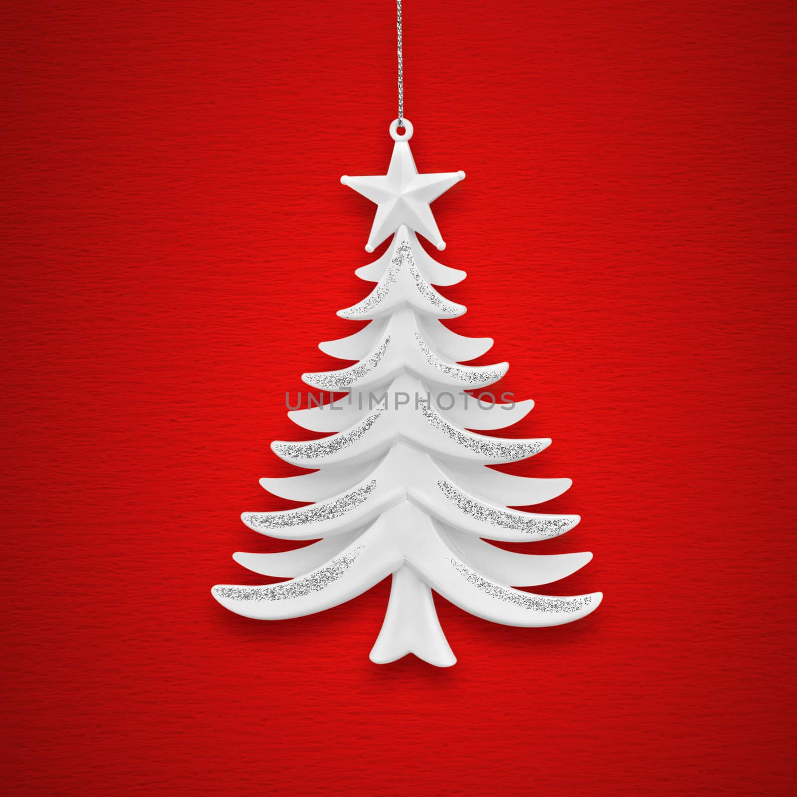 Christmas tree on a background of red paper