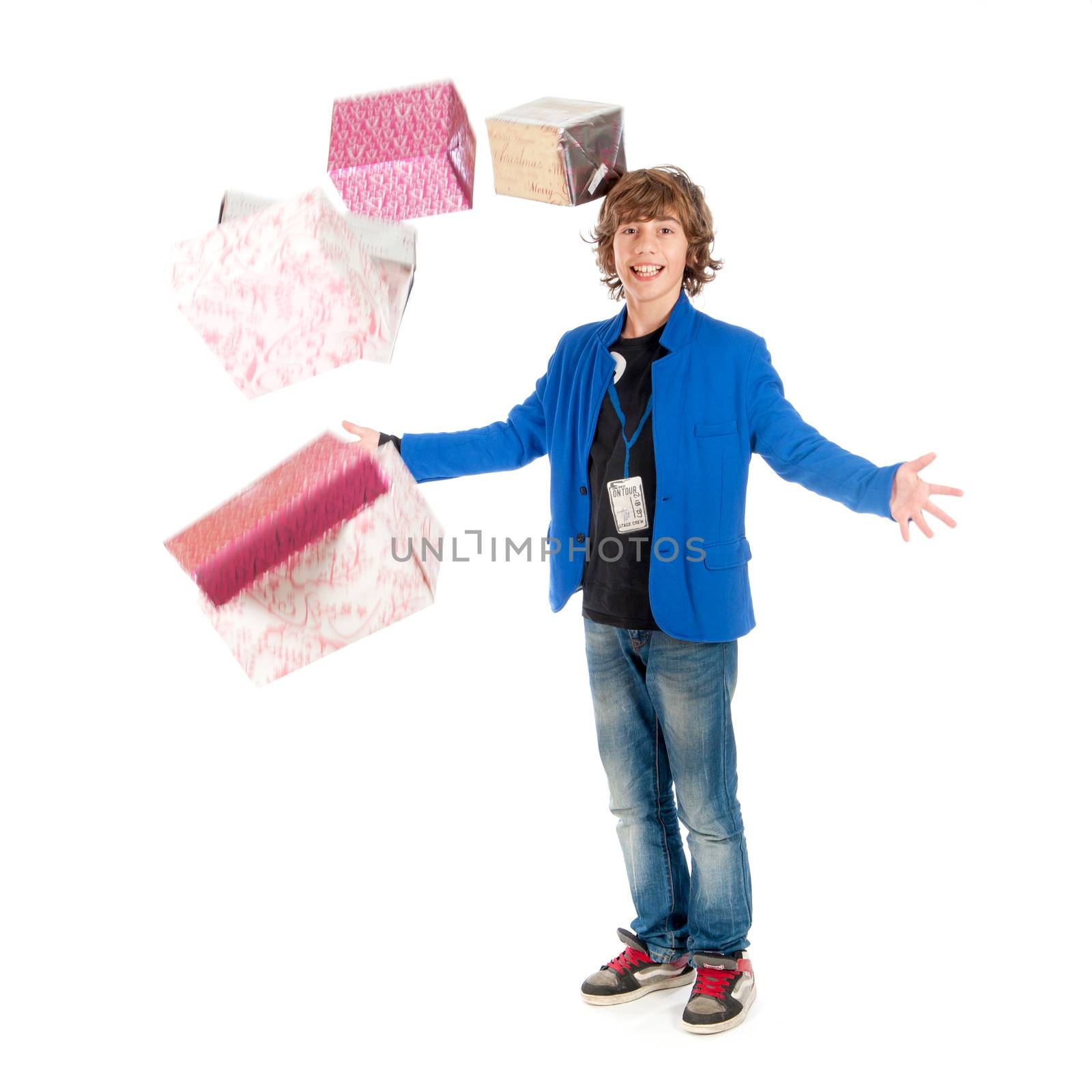 a boy, dressed to party, with a lot of presents