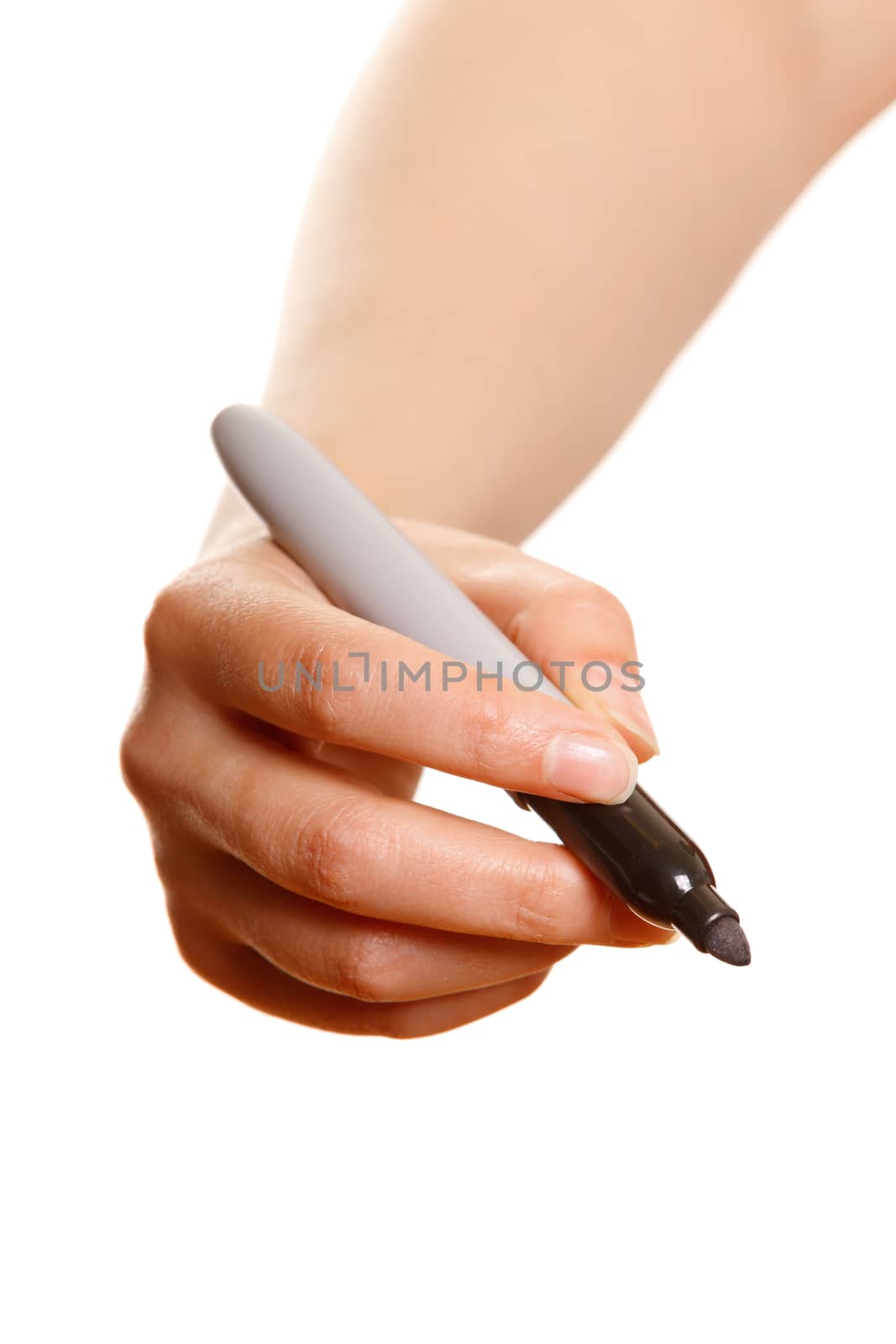 Woman's hand with a black marker writing on a white background