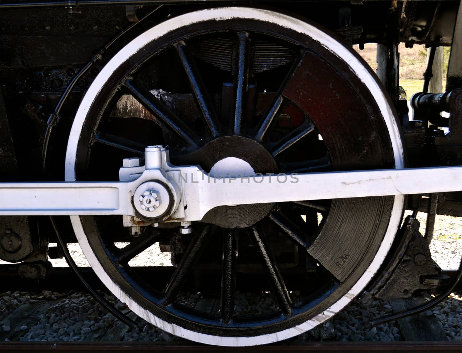Locomotive Wheel by RefocusPhoto