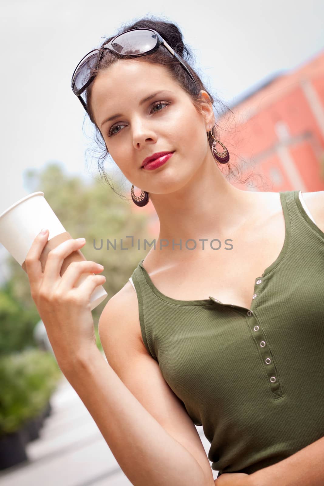 attractive woman with sunglasses in the city summertime by juniart