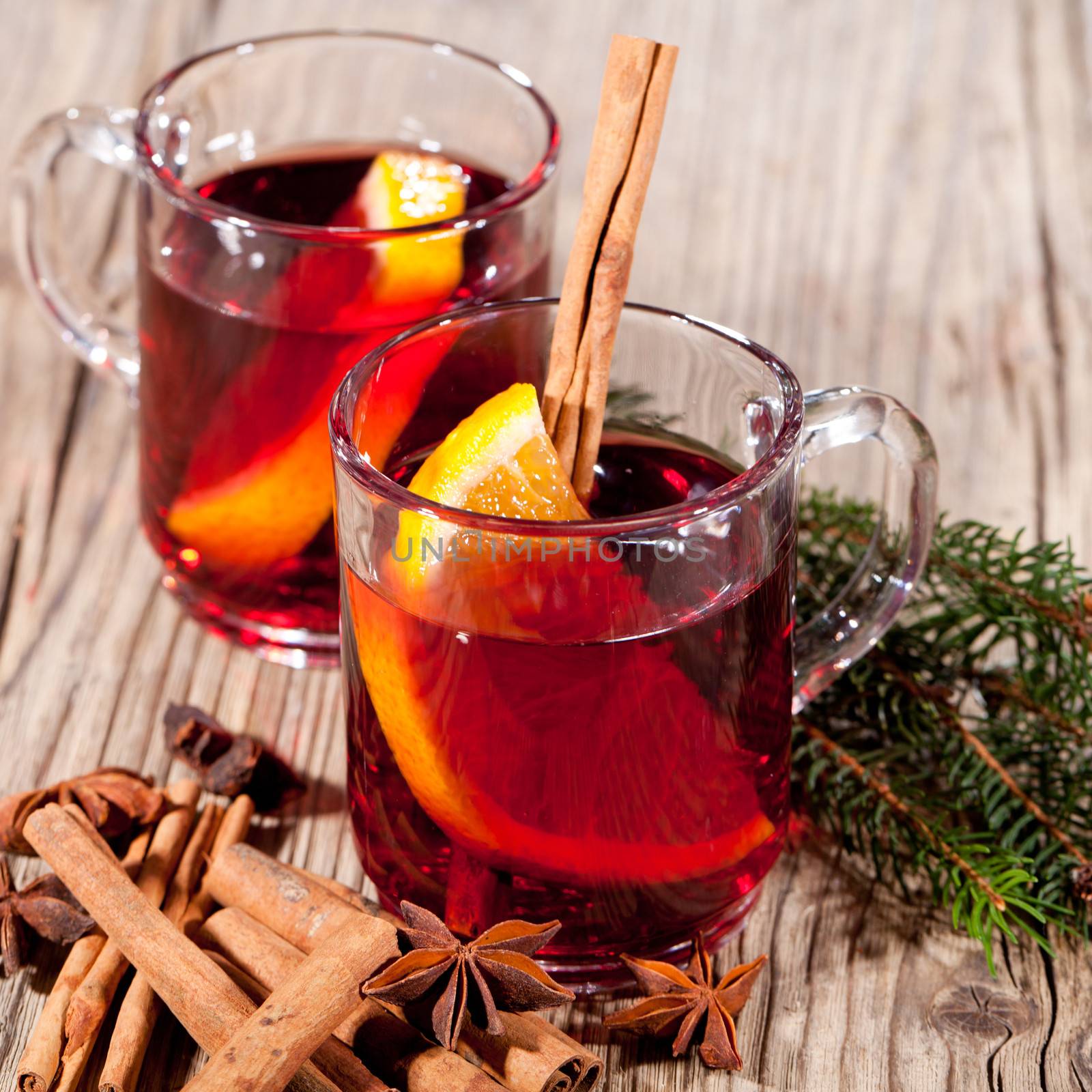 hot tasty spicy mulled red wine with orange and cinnamon christmas  by juniart