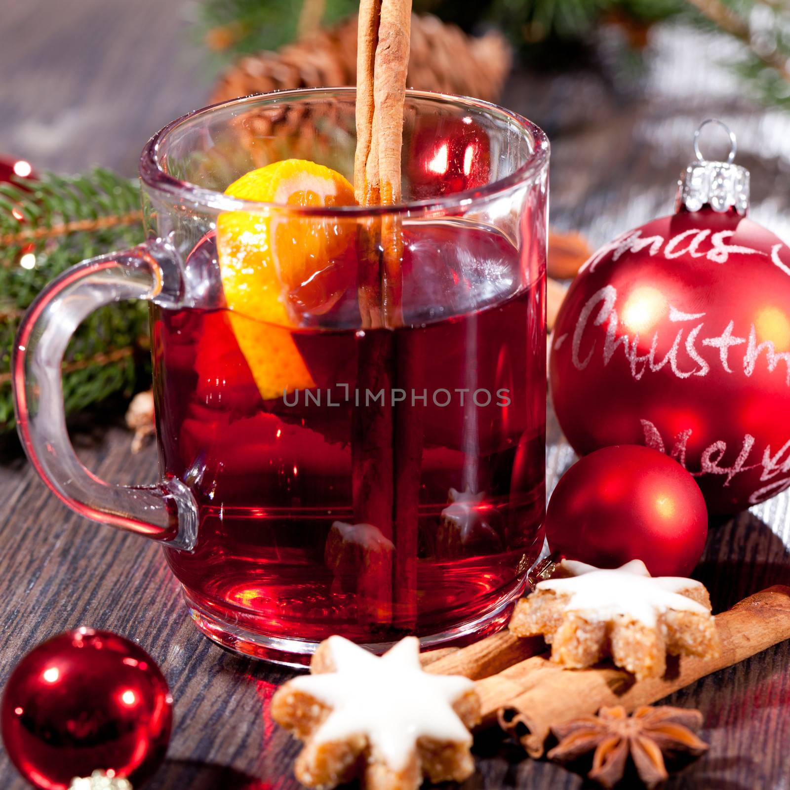 hot tasty spicy mulled red wine with orange and cinnamon christmas  by juniart