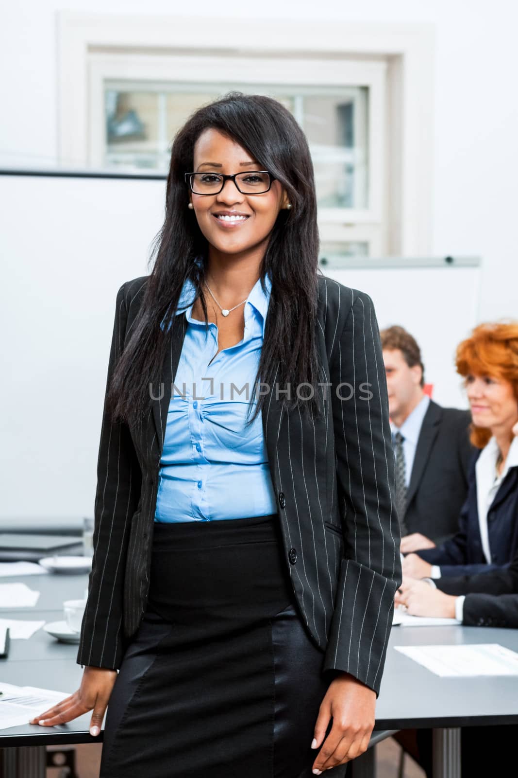 business team on table in office conference seminar presentation