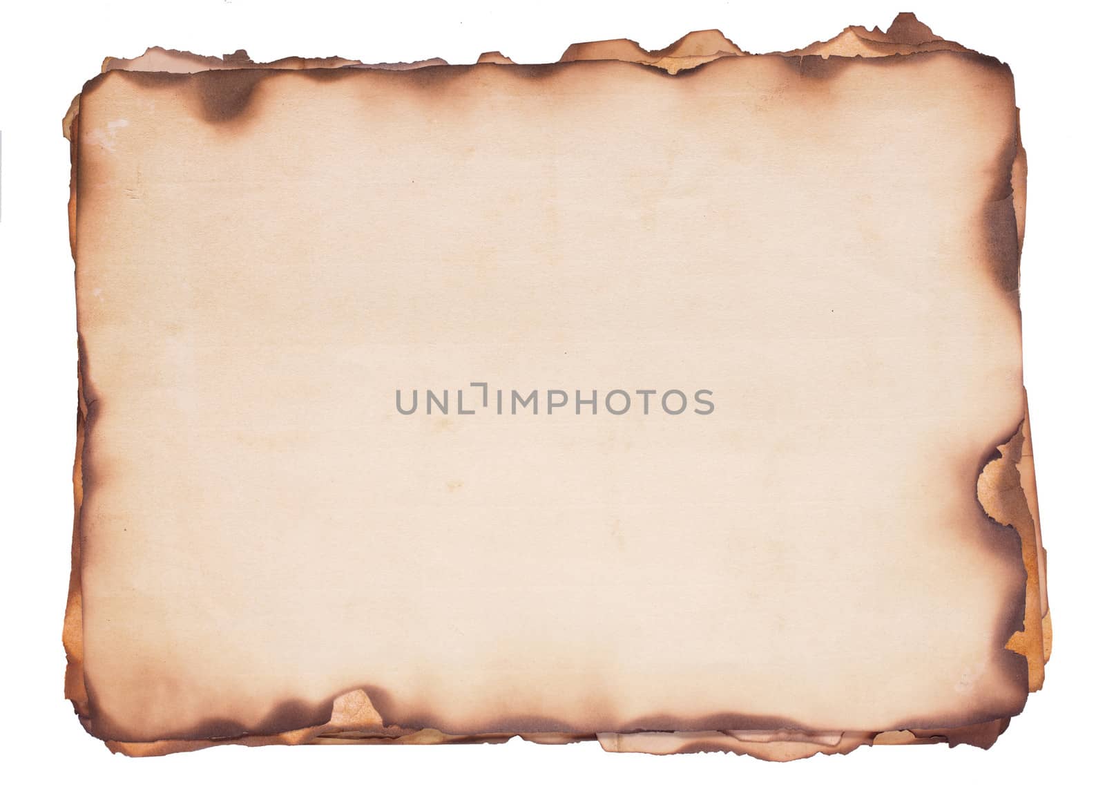 Bundle of several weathered, old papers with fire damaged and burned edges. Isolated on white.