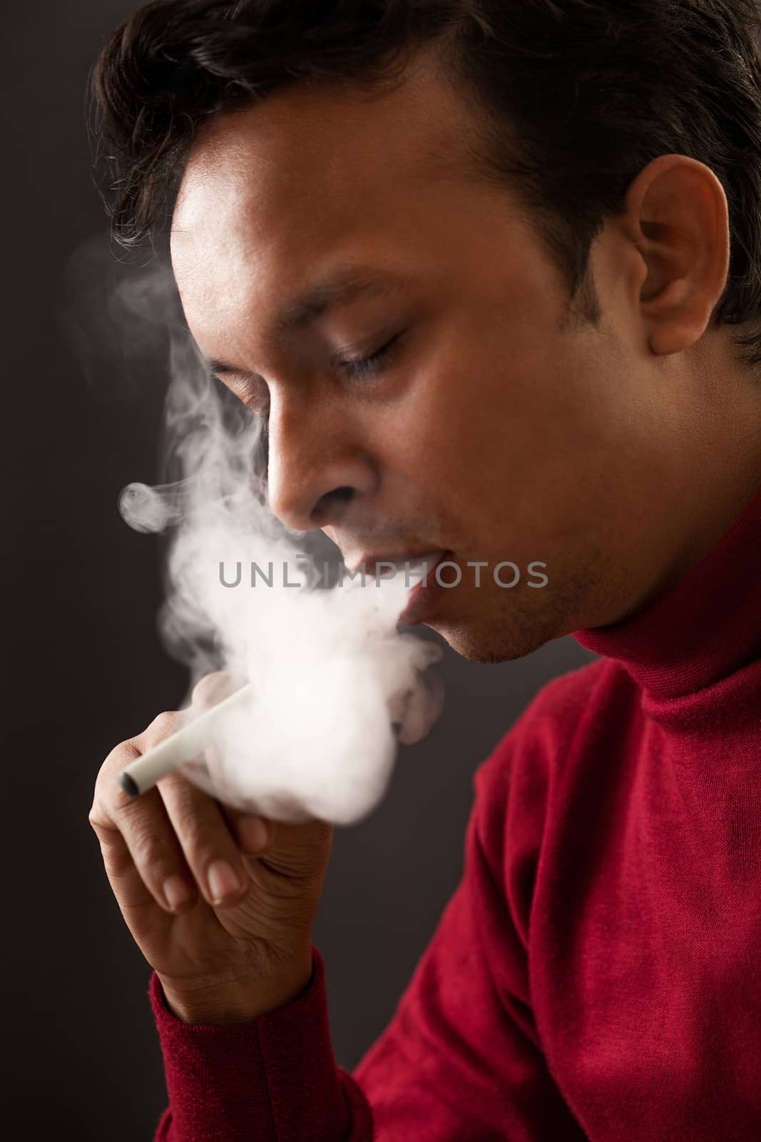 Smoking man using electronic cigarette by ziprashantzi