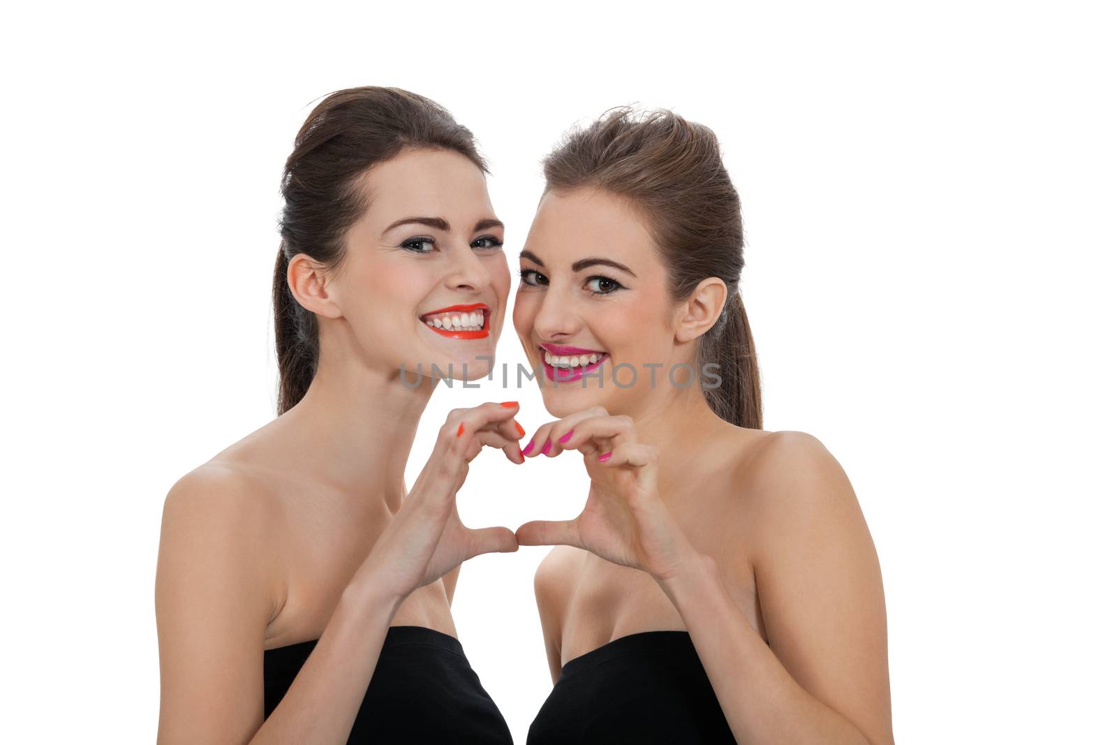 two beautiful girls with colorful makeup isolated on white background