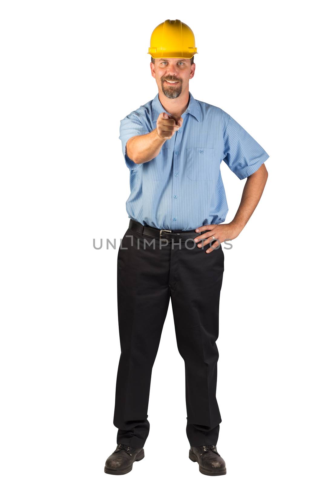 A blue collar worker standing strong with hand on hip and pointing at the camera with his index finger on the other hand.