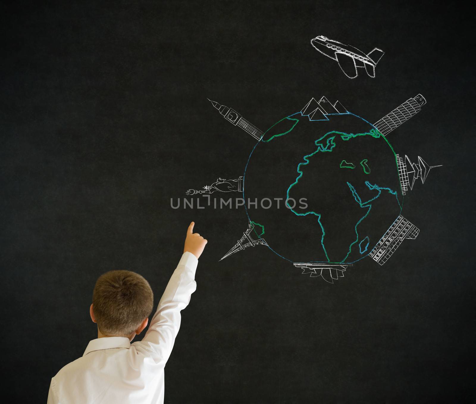 Boy dressed as business man with chalk world wonders on background by alistaircotton