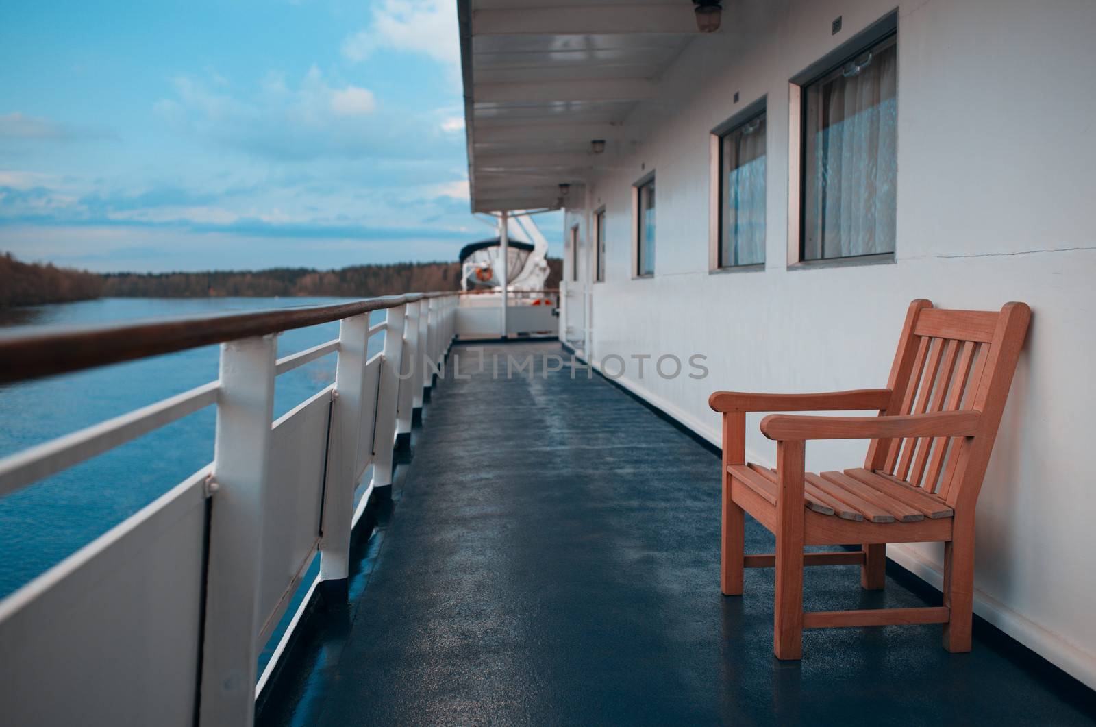 Wooden chair on the deck of cruise liner by danr13