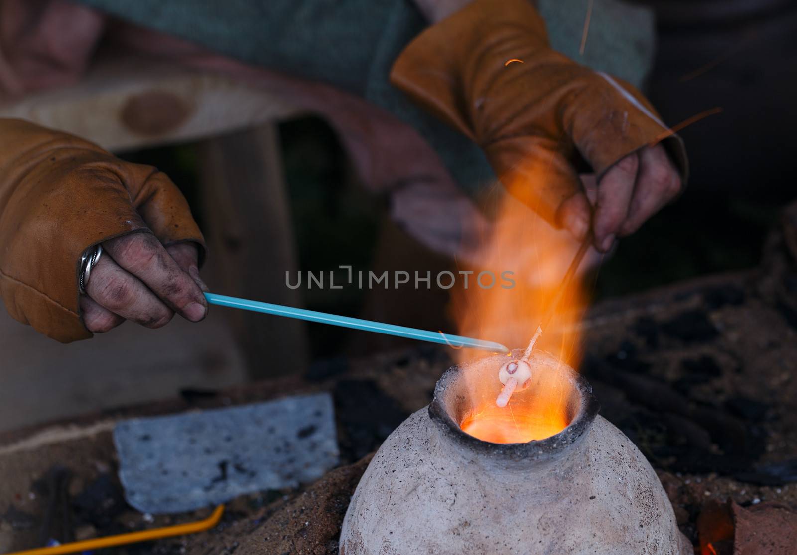 Glass artist in his workshop by danr13