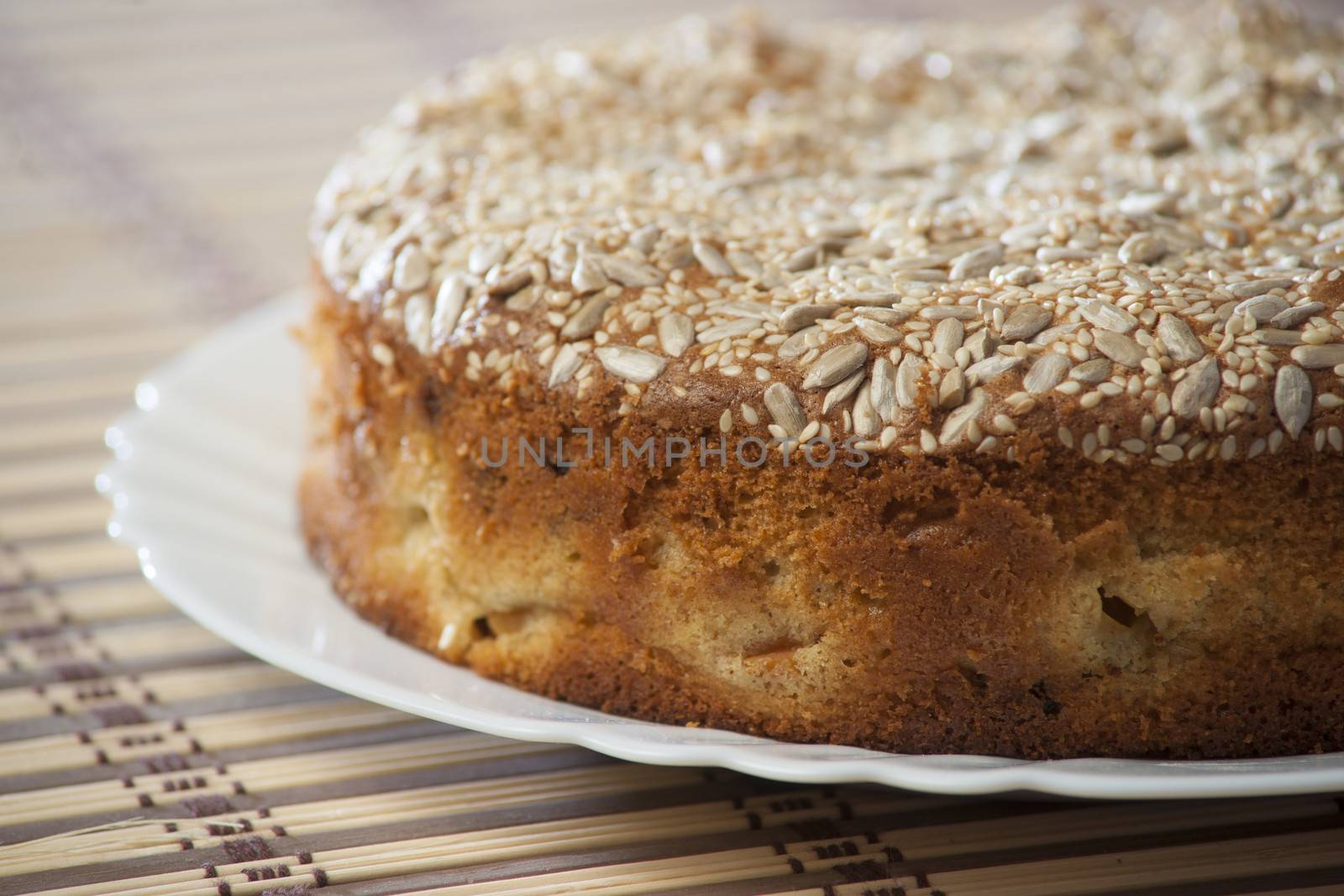 Apricot pie on plate. High resolution