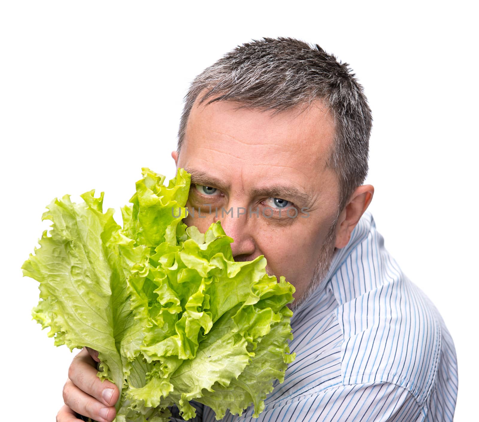 Man holding lettuce isolated on white by palinchak