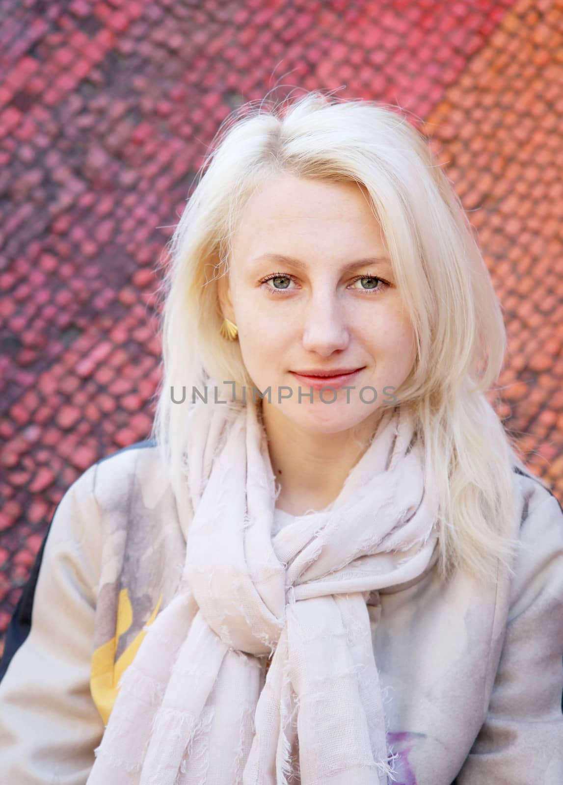 Portrait of young pretty blond girl