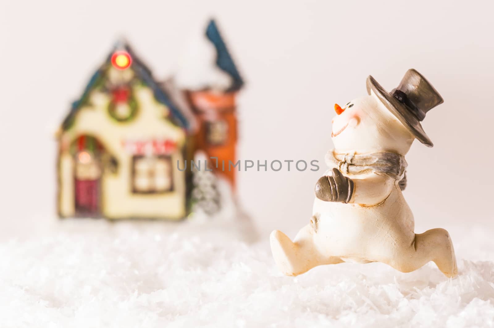 Happy snowman running home on white background