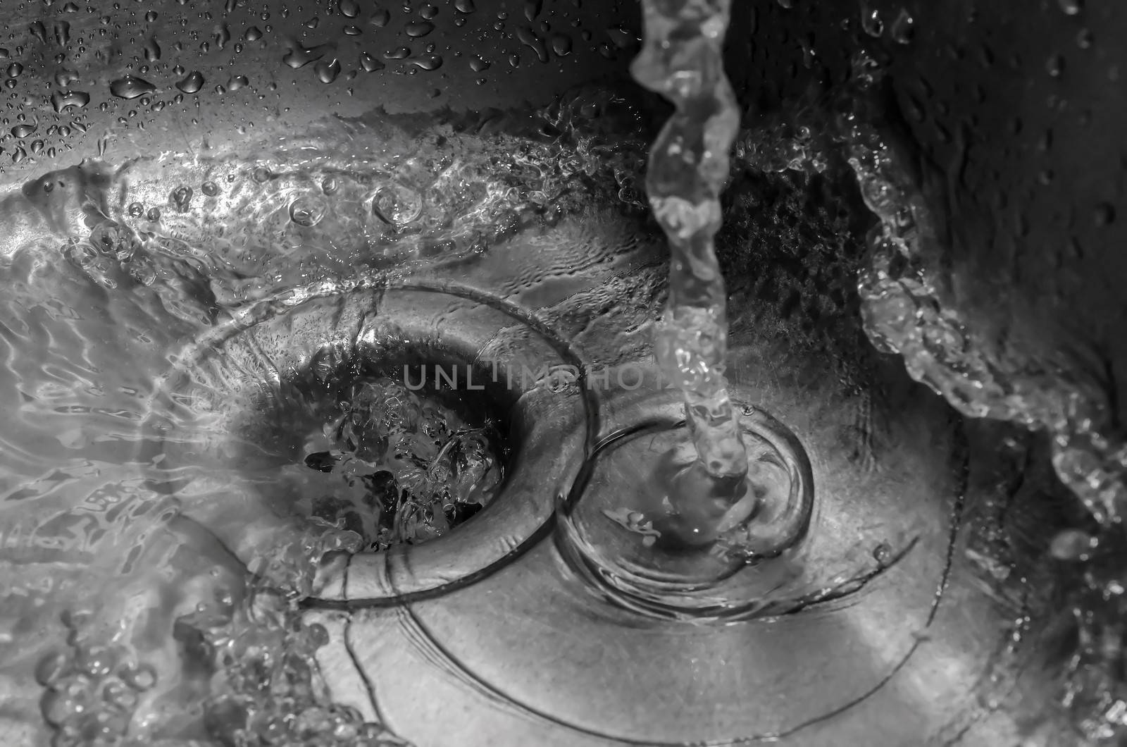 Close-up of kitchen sink with pouring water, Shallow focus, Horizontal shot